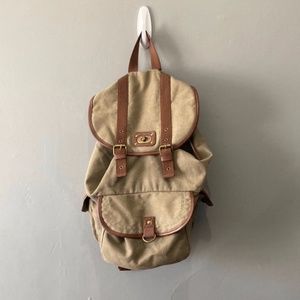 olive and brown backpack